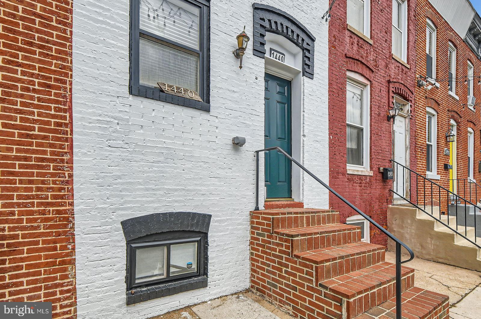 1440 Ward Street Baltimore, MD 21230 - Photo 3 of 27 a view of a brick building with many windows