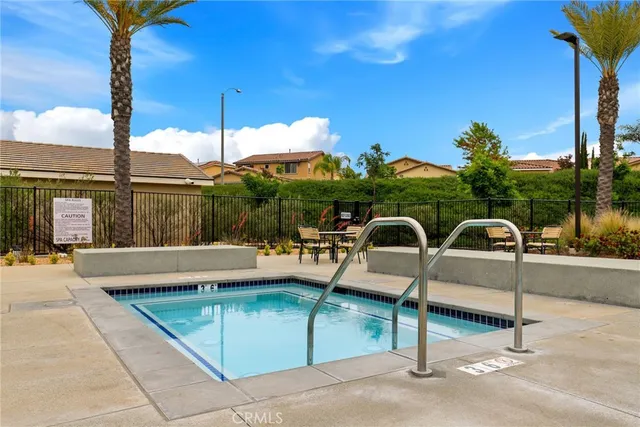 a view of a terrace with couches and wooden floor