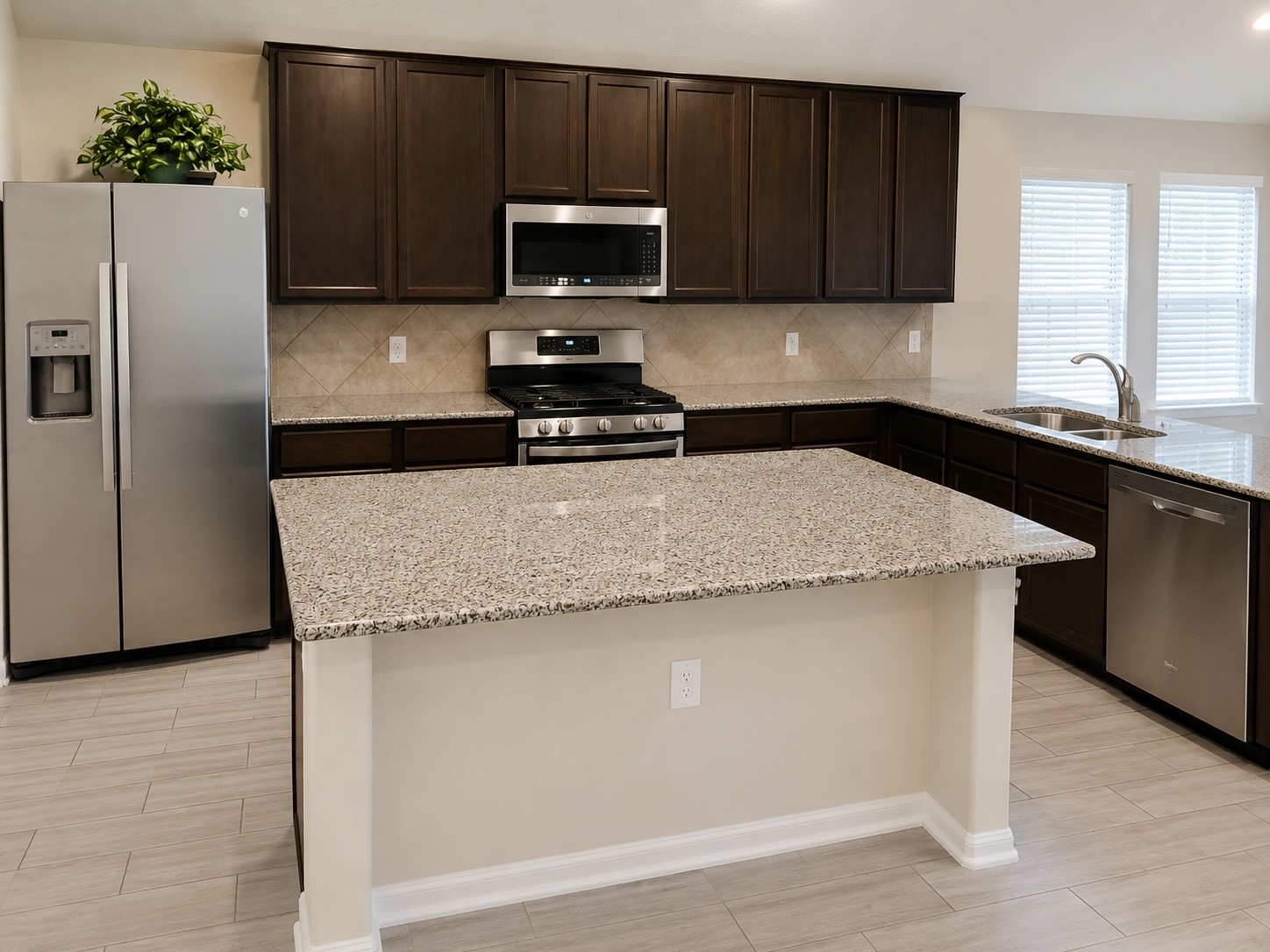1058 Ranch Oak Drive Houston, TX 77073 - Photo 10 of 27 Stainless steel appliances and abundant cabinet space.