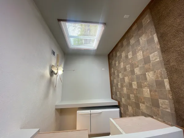 a view of entryway with a front door