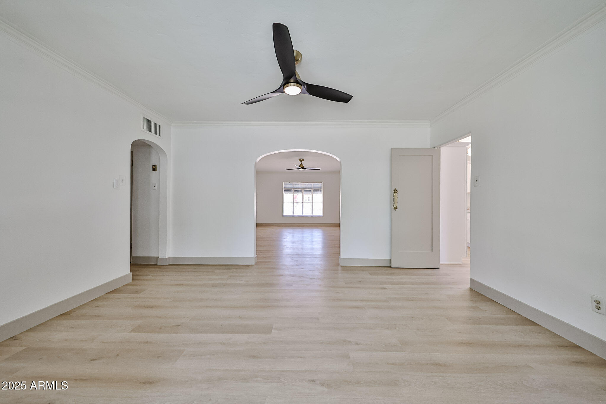 63 West Windsor Avenue Phoenix, AZ 85003 - Photo 10 of 43 a view of empty room with ceiling fan