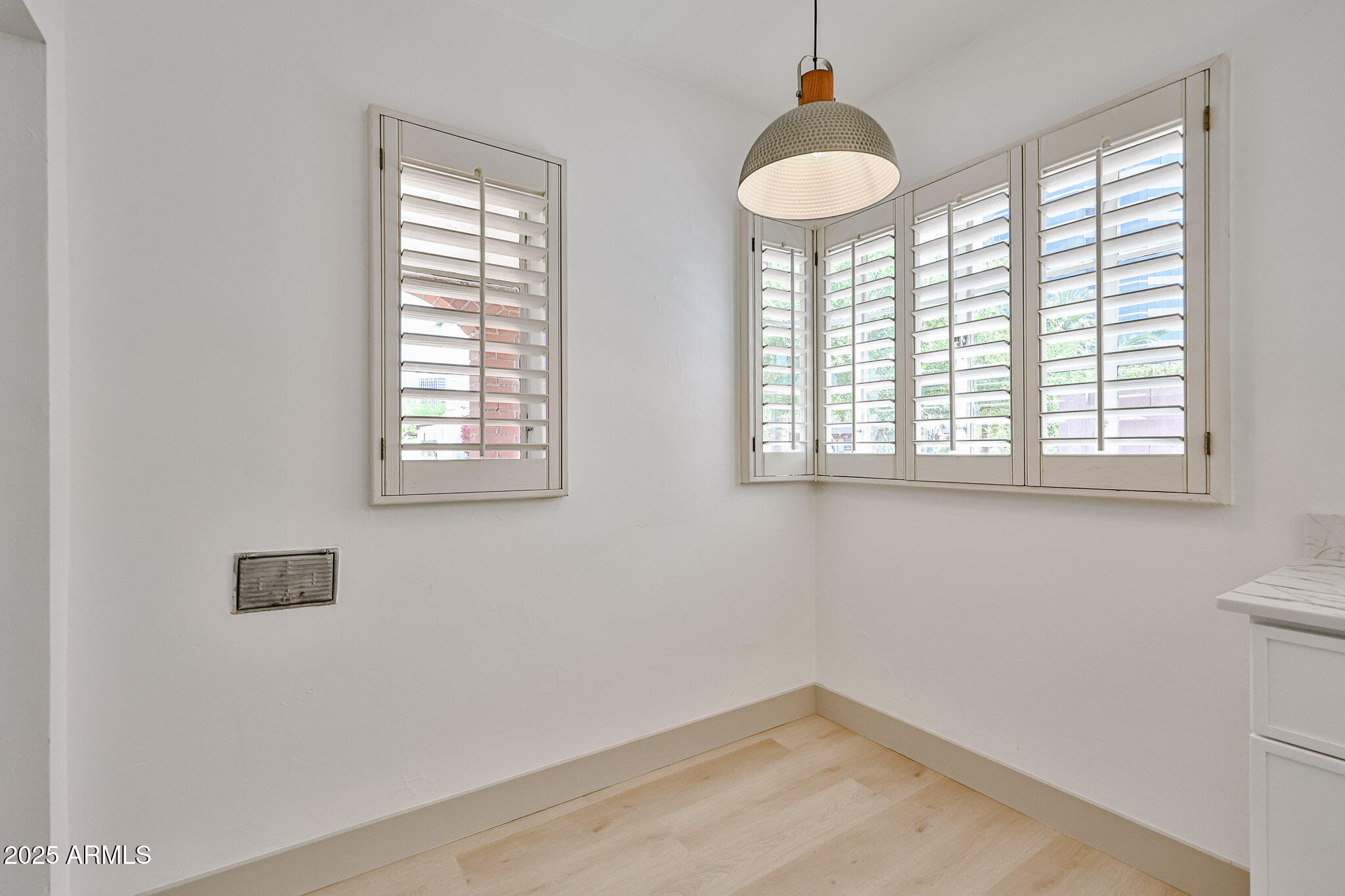 63 West Windsor Avenue Phoenix, AZ 85003 - Photo 19 of 43 an empty room with a window
