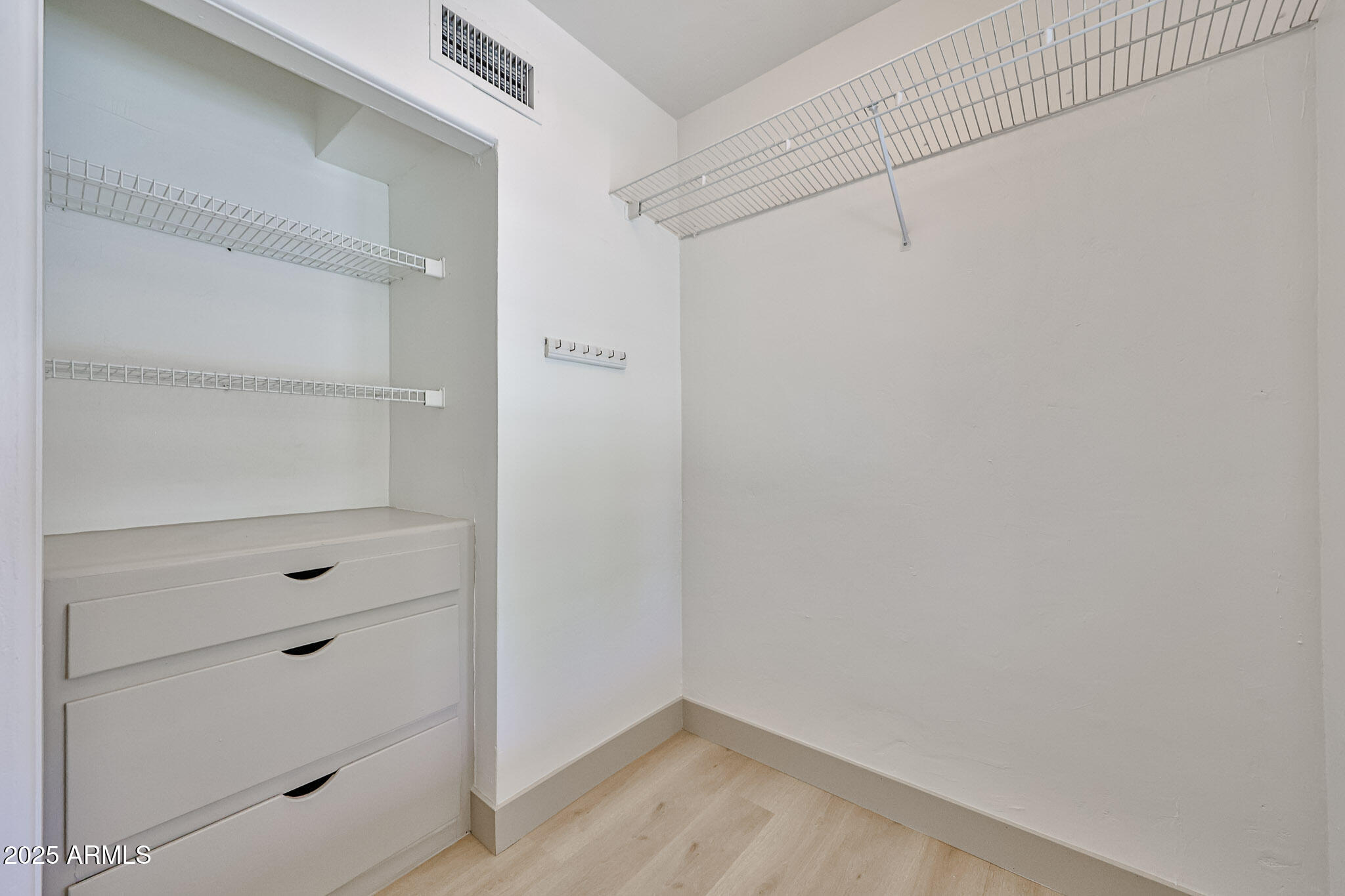 63 West Windsor Avenue Phoenix, AZ 85003 - Photo 22 of 43 a view of an empty walk in closet