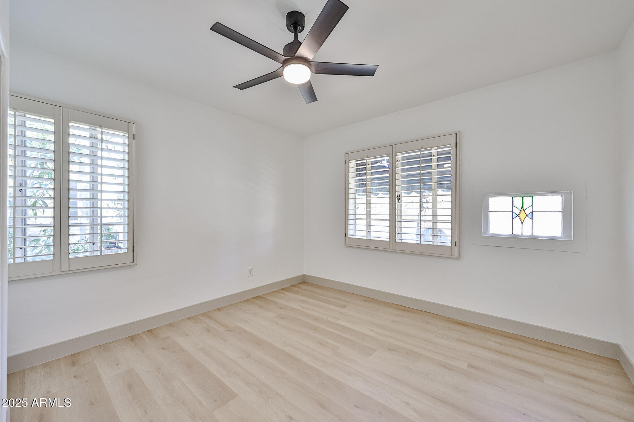 63 West Windsor Avenue Phoenix, AZ 85003 - Photo 23 of 43 a view of an empty room with a window