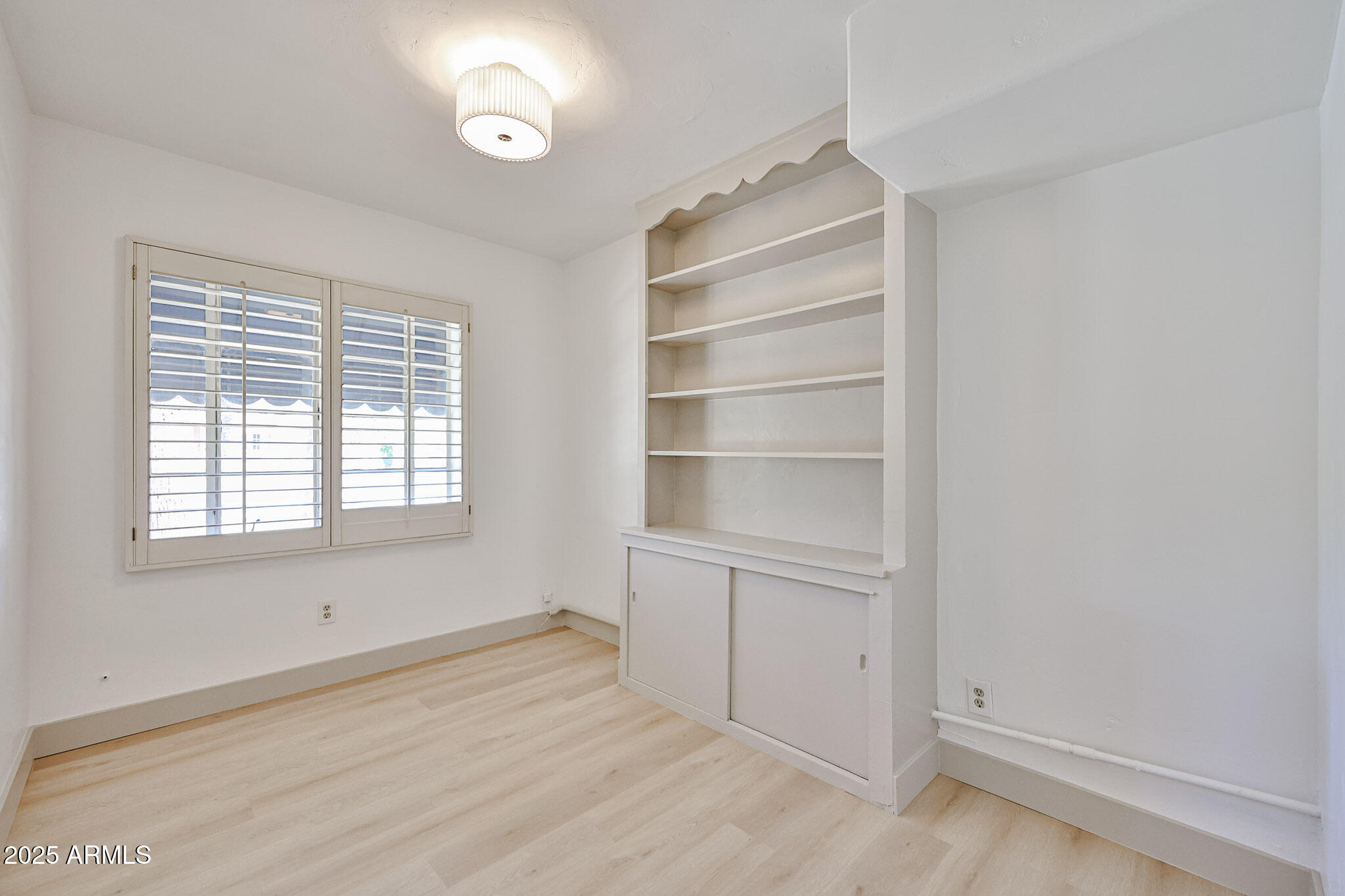 63 West Windsor Avenue Phoenix, AZ 85003 - Photo 26 of 43 a view of an empty room with a window