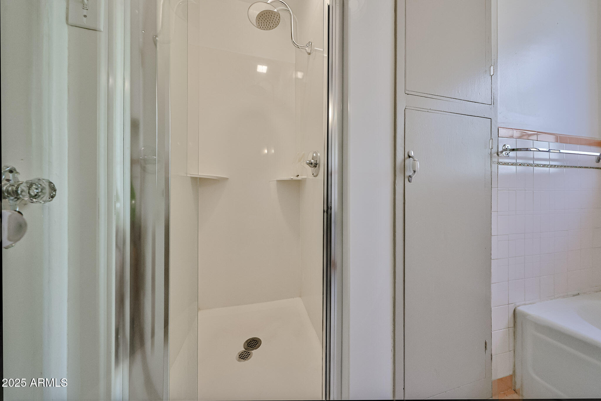 63 West Windsor Avenue Phoenix, AZ 85003 - Photo 32 of 43 a bathroom with a shower and a toilet