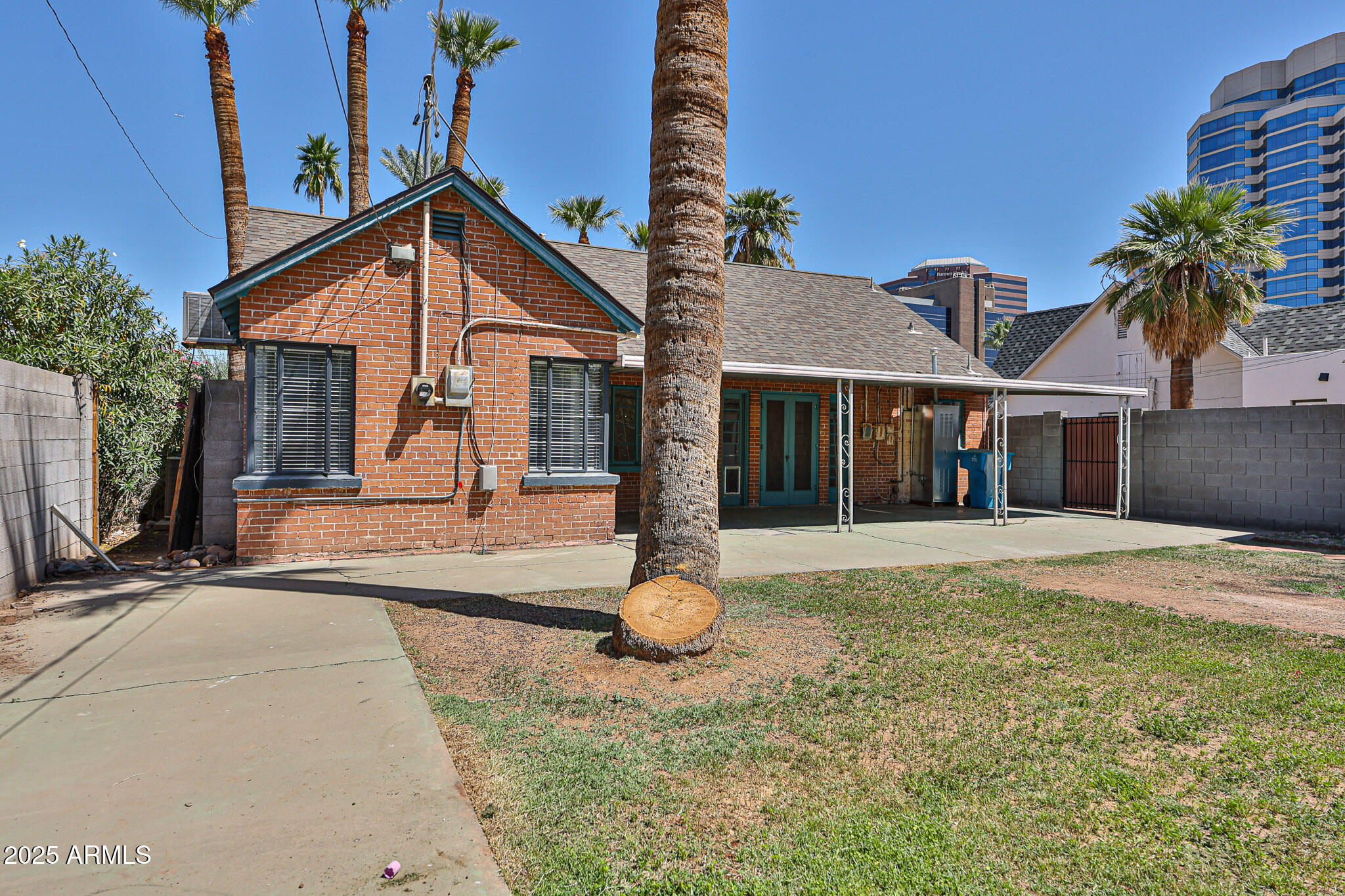 63 West Windsor Avenue Phoenix, AZ 85003 - Photo 39 of 43 a front view of a house with a yard and porch