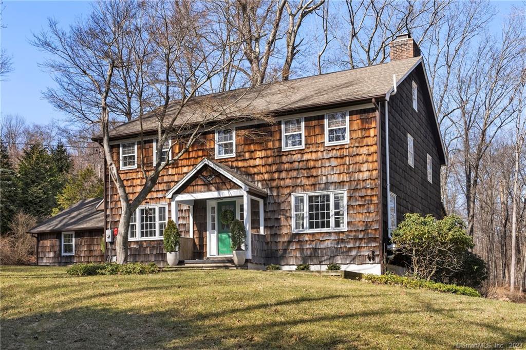 95 Dayton Road Redding, CT 06896 - Photo 1 of 1 a front view of a house with a yard