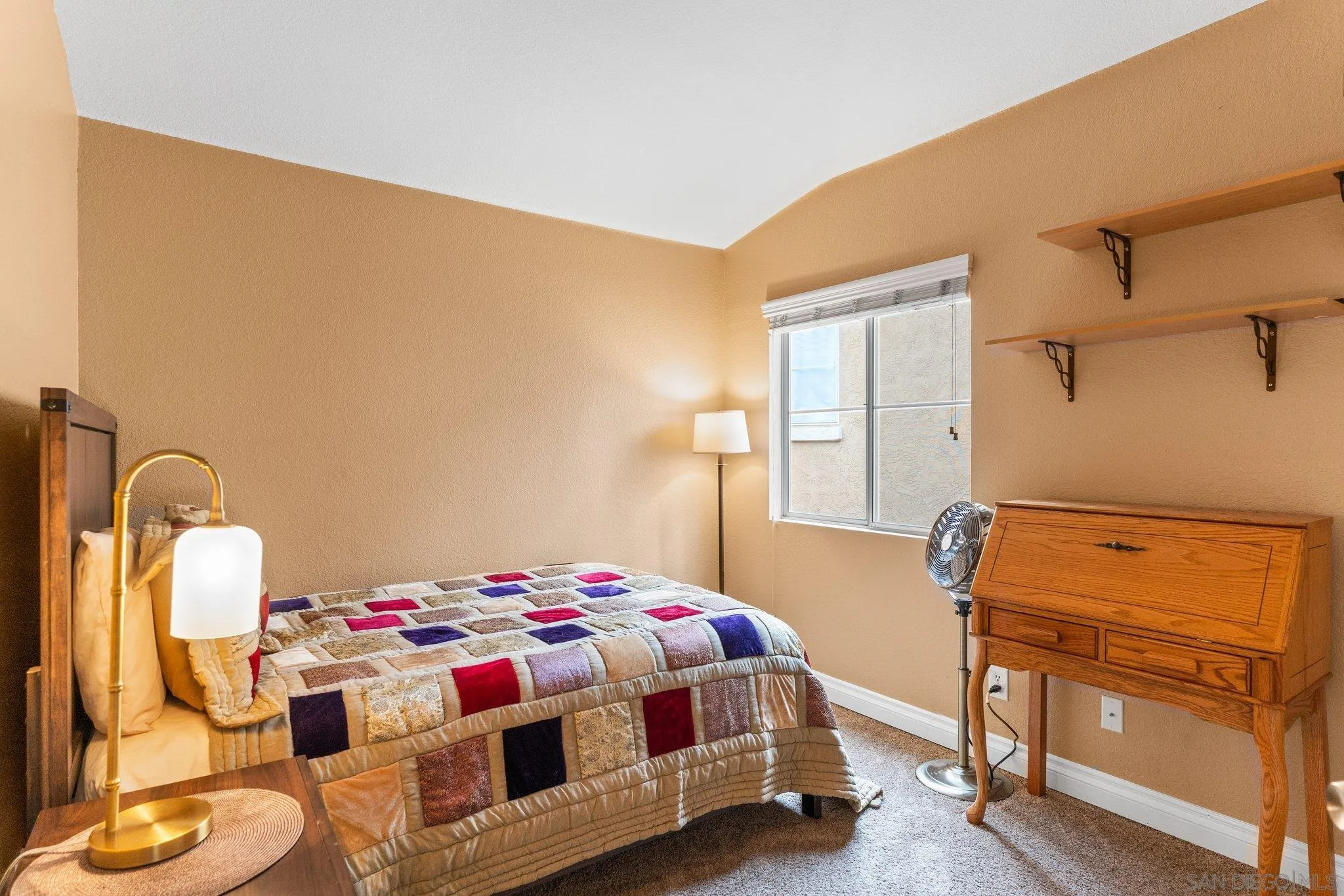 13801 Pinkard Way, Unit 8 El Cajon, CA 92021 - Photo 18 of 29 a bedroom with a bed and dresser