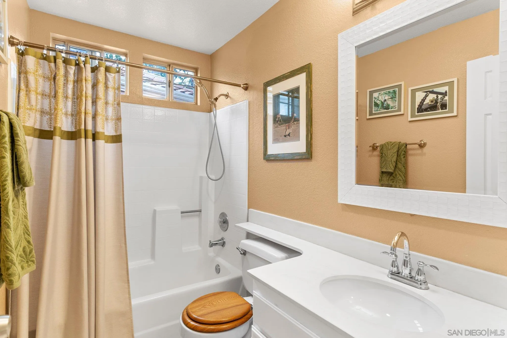 13801 Pinkard Way, Unit 8 El Cajon, CA 92021 - Photo 19 of 29 a bathroom with a sink toilet and shower
