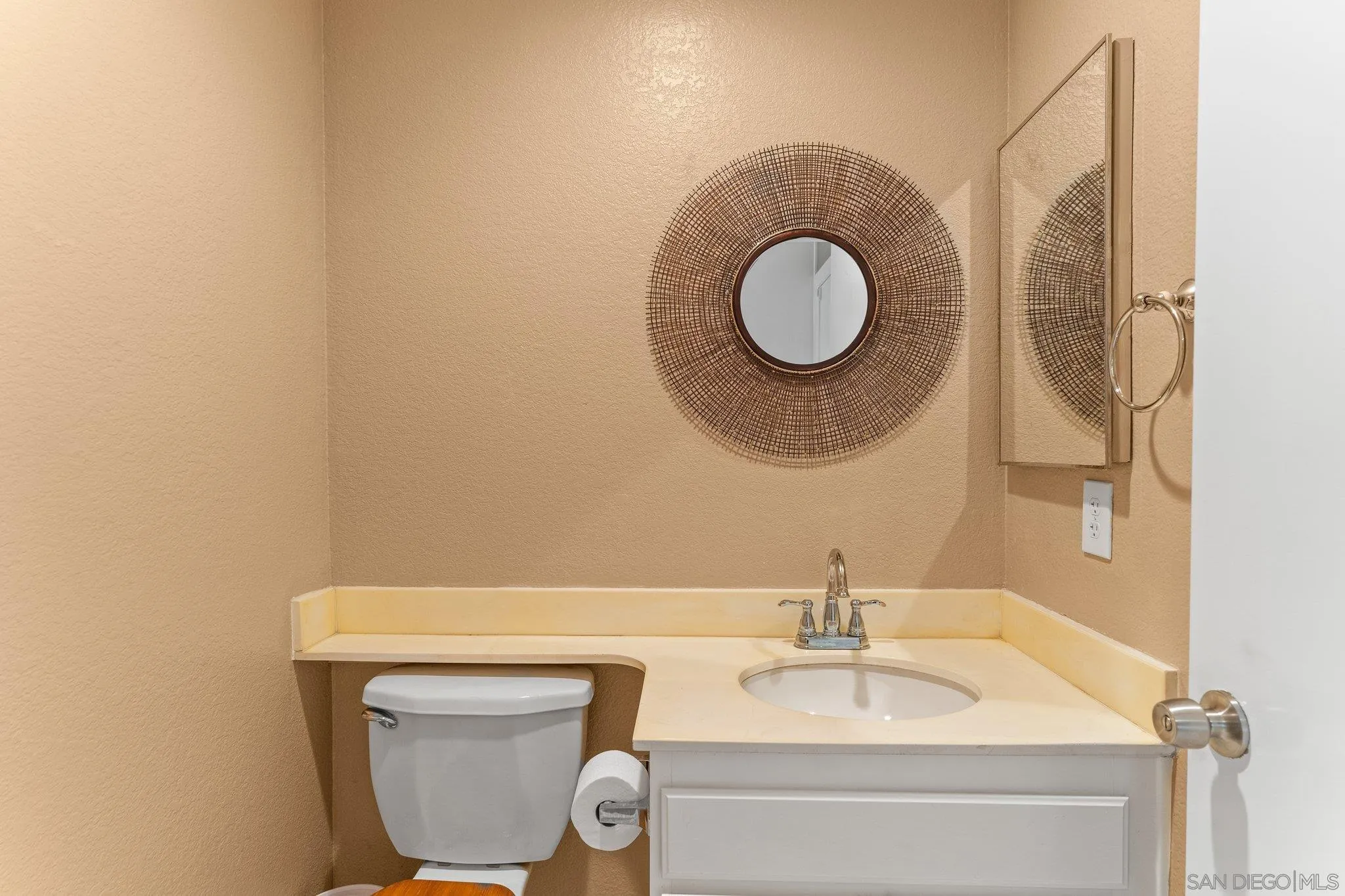 13801 Pinkard Way, Unit 8 El Cajon, CA 92021 - Photo 20 of 29 a bathroom with a sink and a mirror