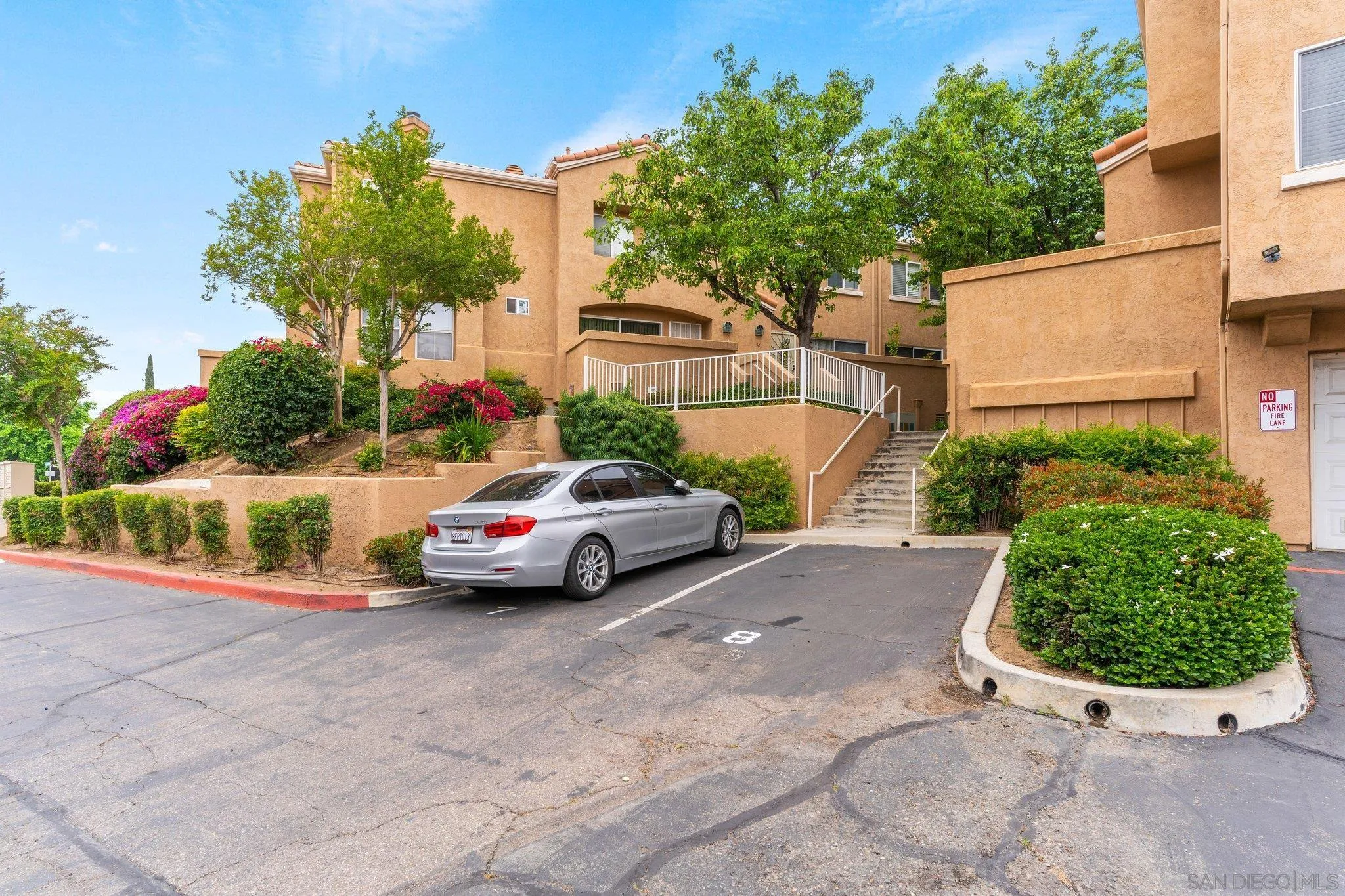 13801 Pinkard Way, Unit 8 El Cajon, CA 92021 - Photo 24 of 29 a view of a car parked in front of a house