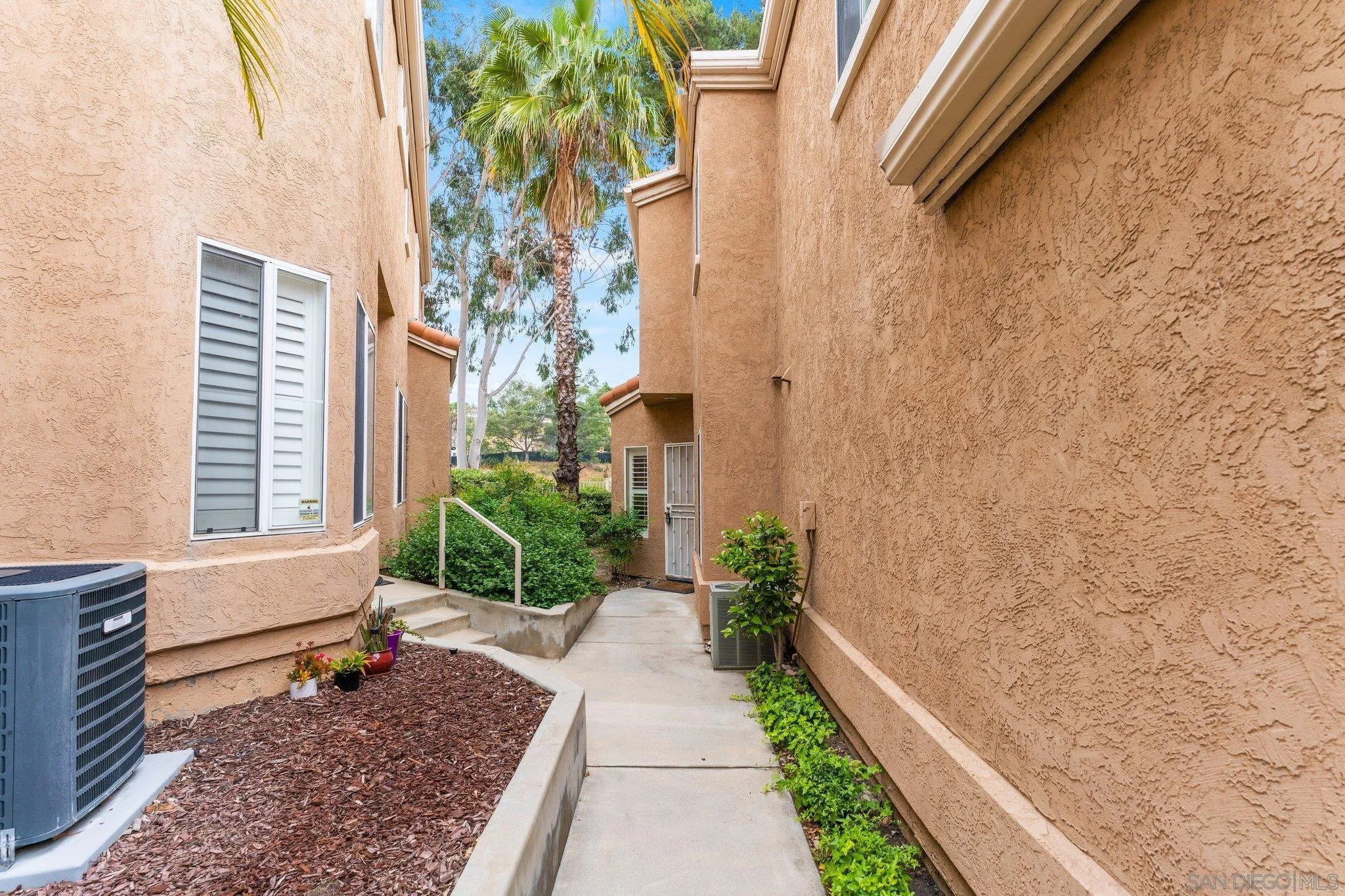 13801 Pinkard Way, Unit 8 El Cajon, CA 92021 - Photo 27 of 29 a garden view with a seating space