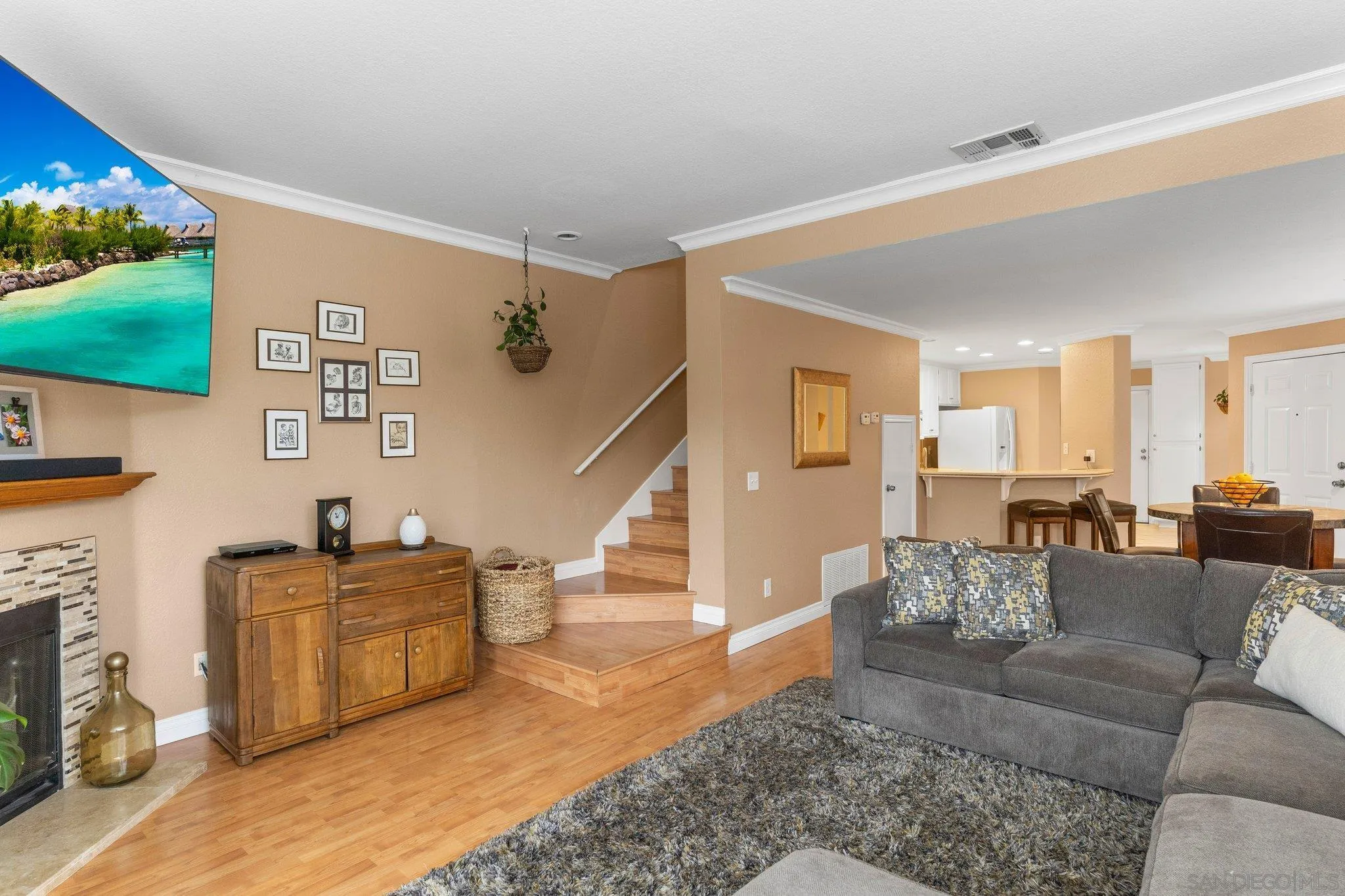 13801 Pinkard Way, Unit 8 El Cajon, CA 92021 - Photo 6 of 29 a living room with furniture and a flat screen tv