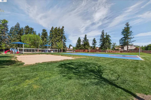 a park bench sitting in the middle of a park