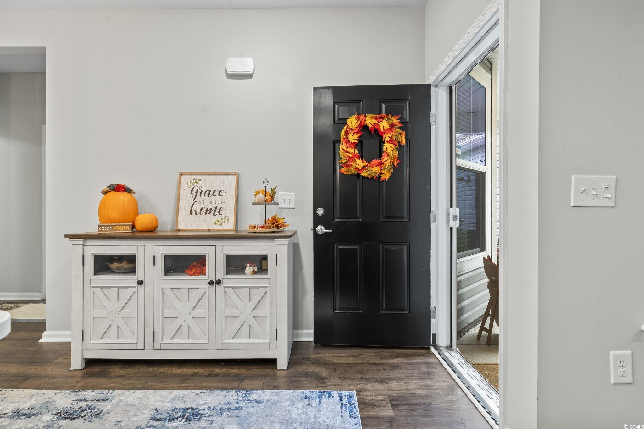 4040 Taranto Loop, Unit 5303C Myrtle Beach, SC 29579 - Photo 4 of 38 Entrance foyer with dark wood-style flooring