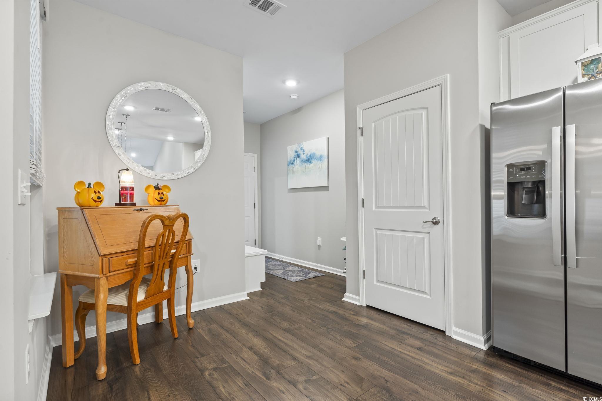 4040 Taranto Loop, Unit 5303C Myrtle Beach, SC 29579 - Photo 6 of 38 Dining space with dark wood finished floors and recessed lighting