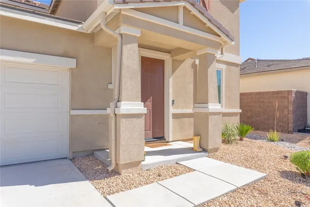 a view of a house with a street