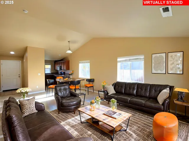 a living room with furniture and a couch