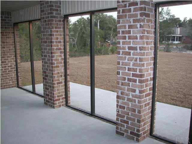 6671 Bryant Road Navarre, FL 32566 - Photo 10 of 25 Screened Back Porch