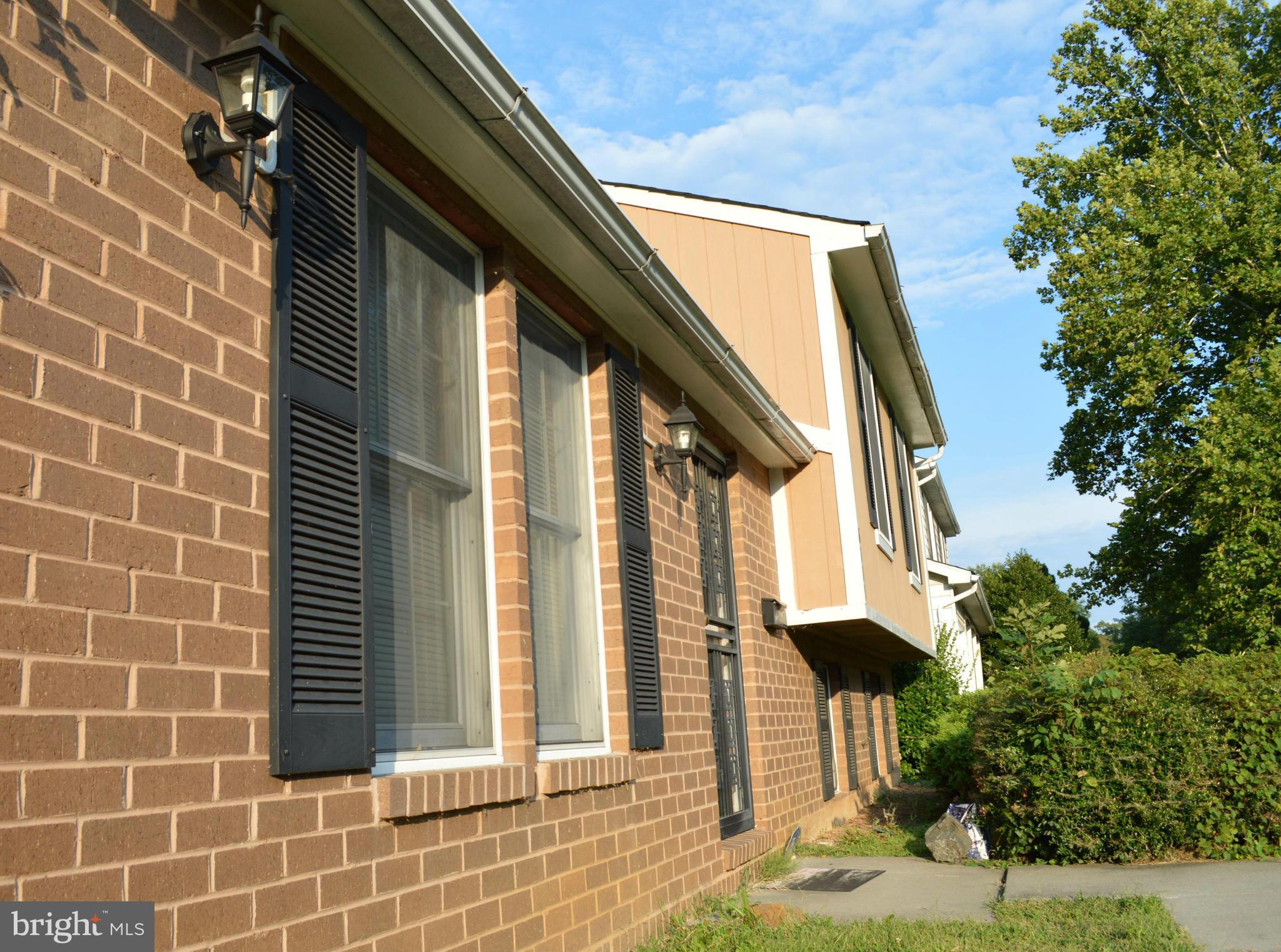 6111 Western Run Drive Baltimore, MD 21209 - Photo 2 of 27 a view of a house with a backyard