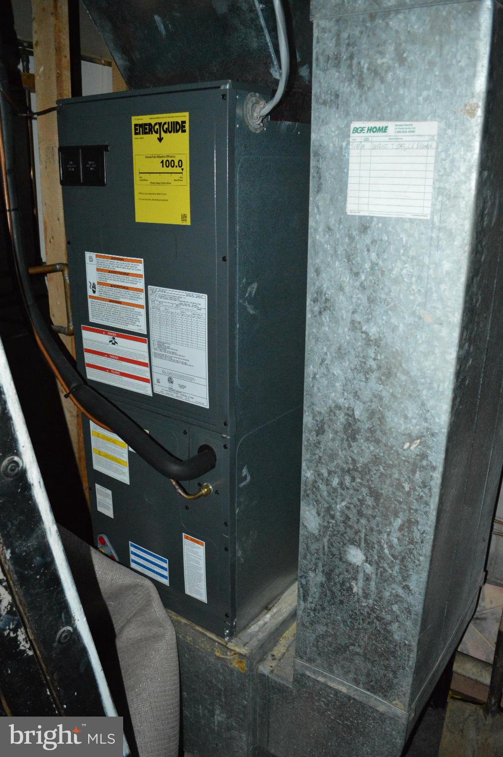 6111 Western Run Drive Baltimore, MD 21209 - Photo 25 of 27 a bathroom with a sink and a mirror