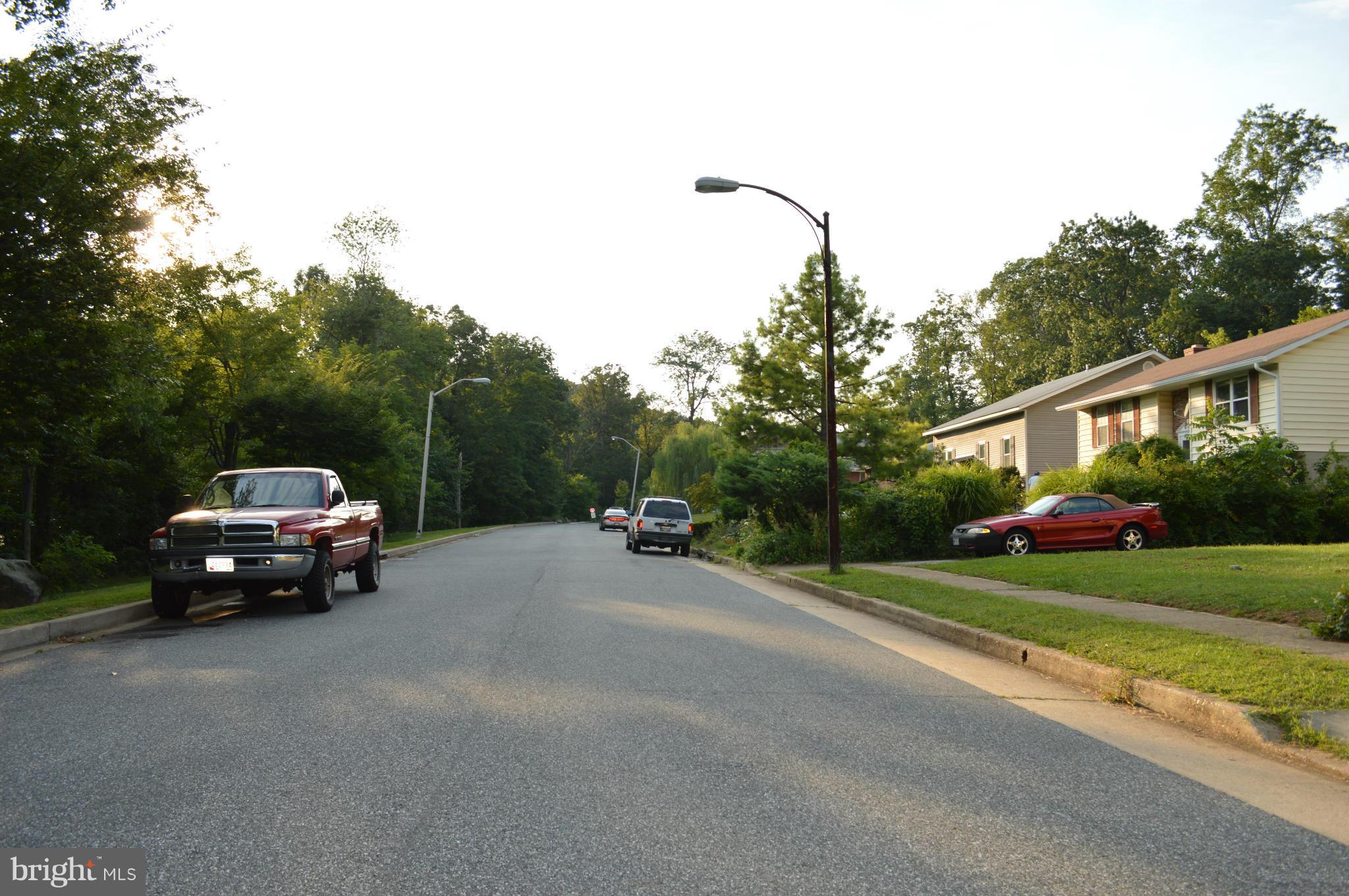 6111 Western Run Drive Baltimore, MD 21209 - Photo 27 of 27 a car parked on the side of the road