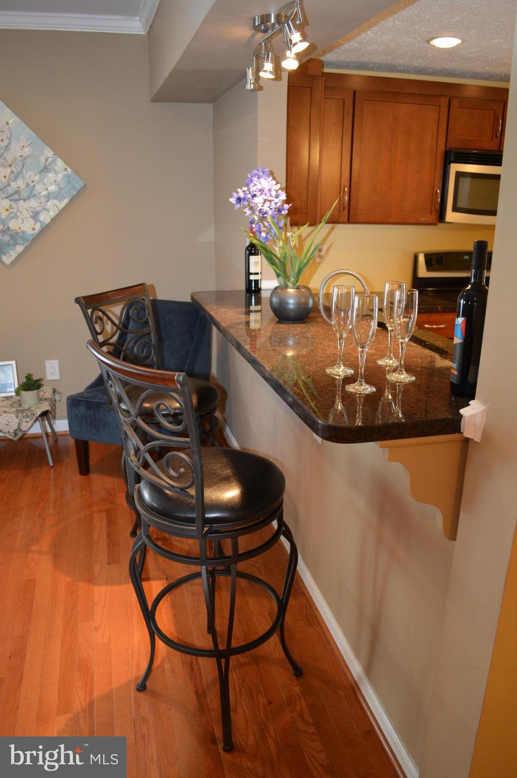6111 Western Run Drive Baltimore, MD 21209 - Photo 5 of 27 a dining room with furniture and wooden floor