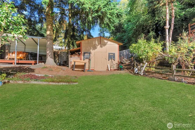 a view of a chairs and table in the patio