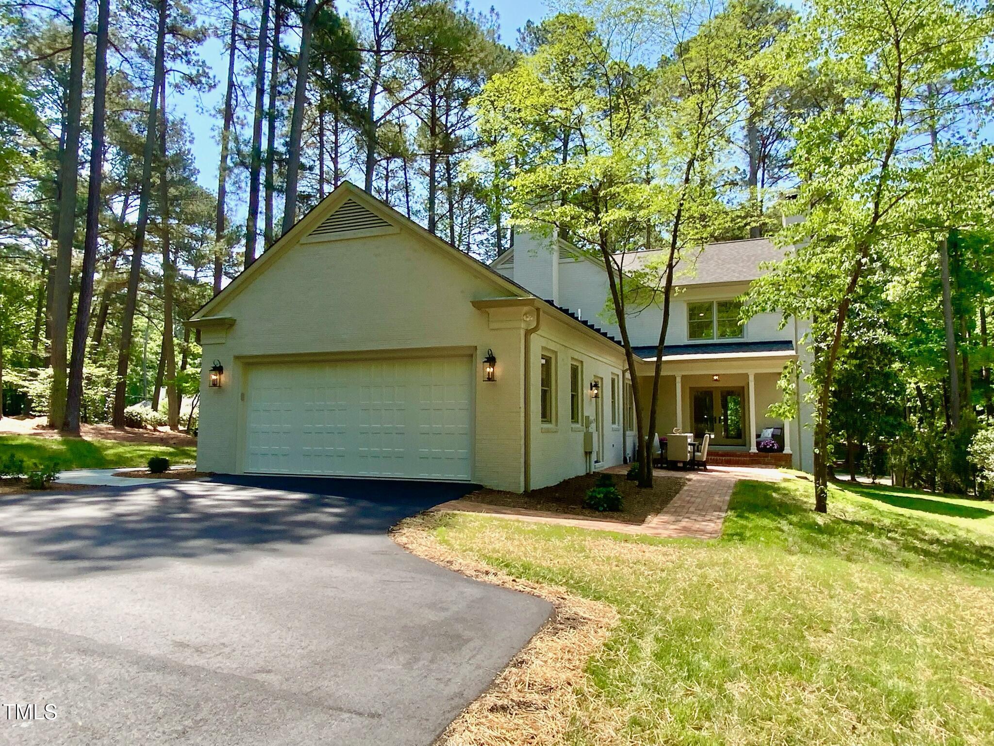 3838 Regent Road Durham, NC 27707 - Photo 12 of 55 a view of a house with a yard