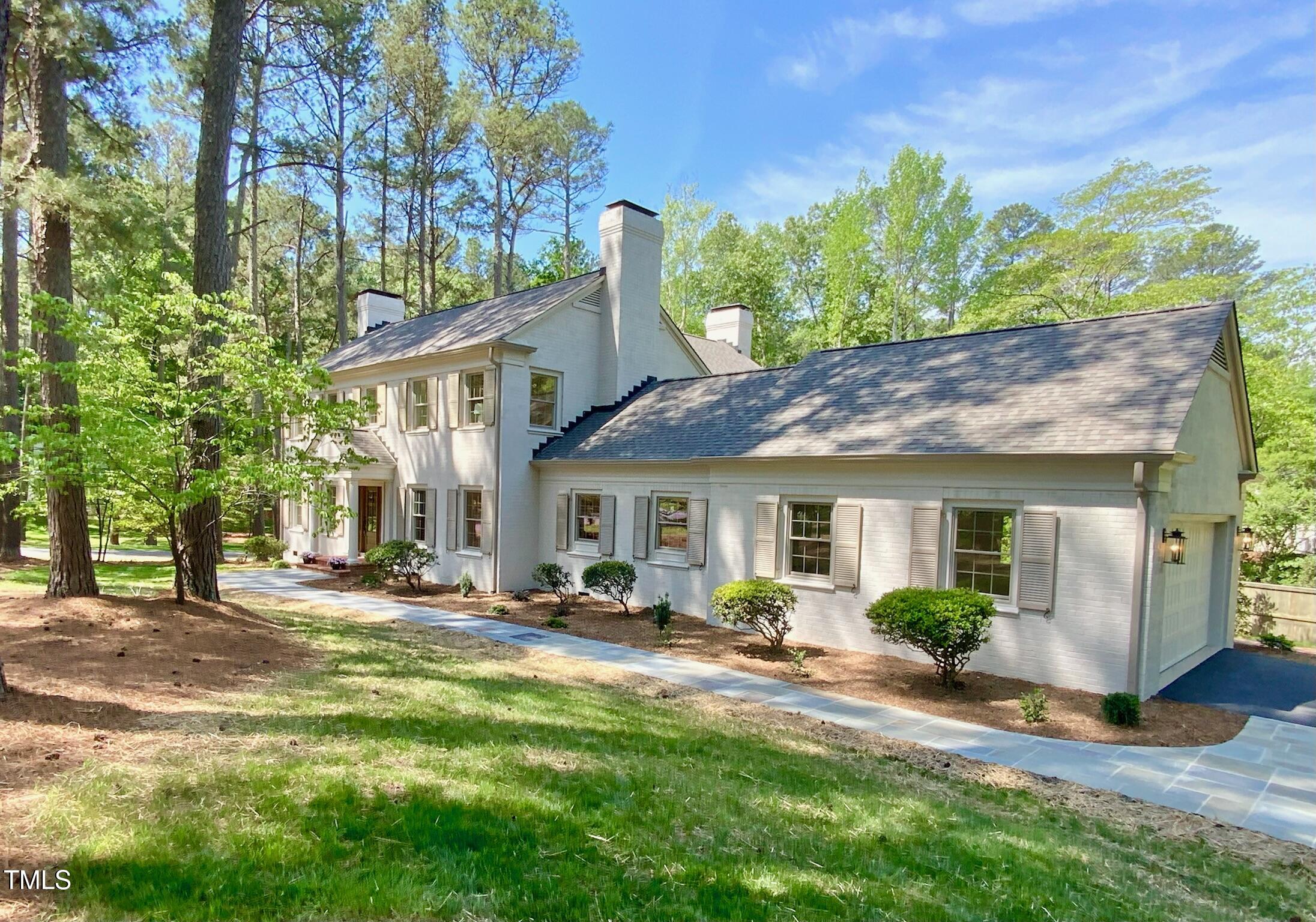 3838 Regent Road Durham, NC 27707 - Photo 2 of 55 a front view of a house with garden