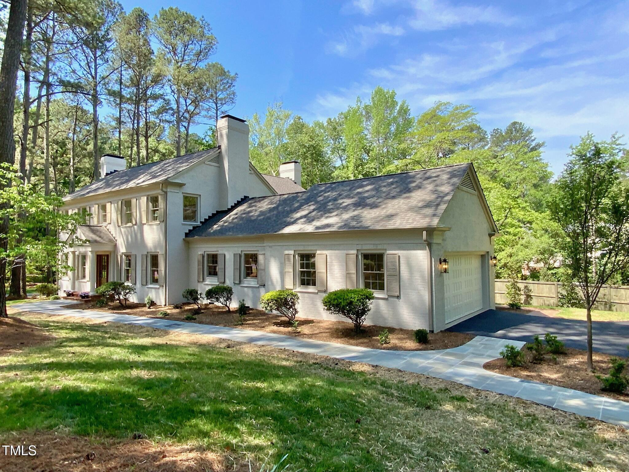 3838 Regent Road Durham, NC 27707 - Photo 53 of 55 a front view of house with yard outdoor seating and green space