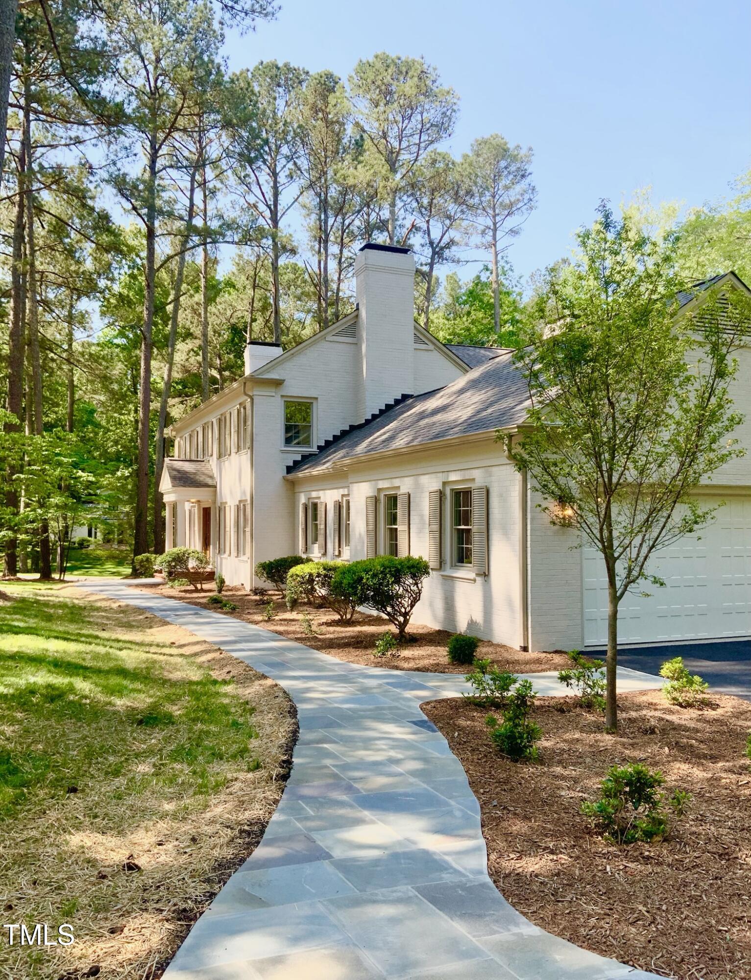 3838 Regent Road Durham, NC 27707 - Photo 55 of 55 a front view of a house with a yard