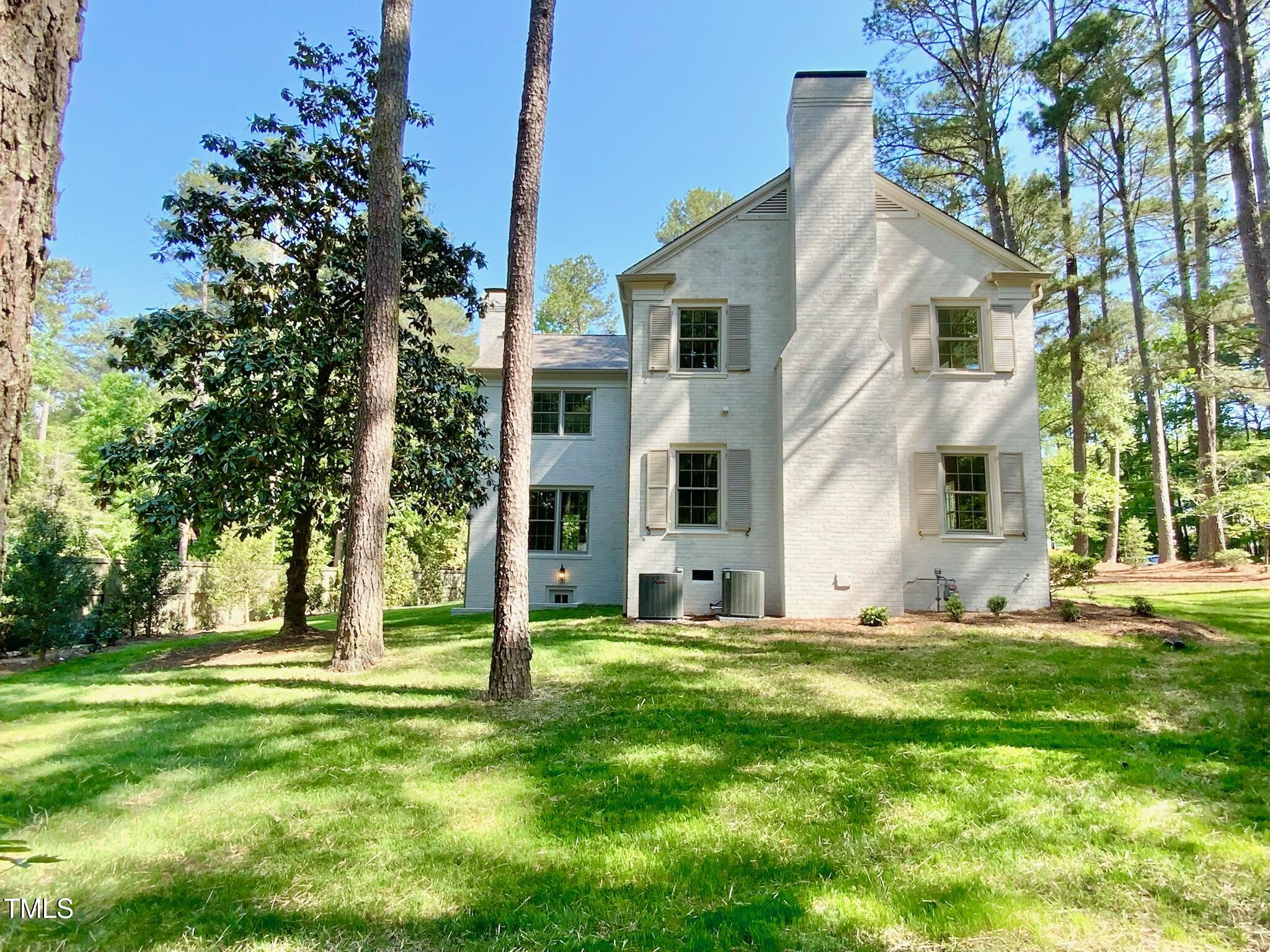 3838 Regent Road Durham, NC 27707 - Photo 7 of 55 a view of a house with a yard