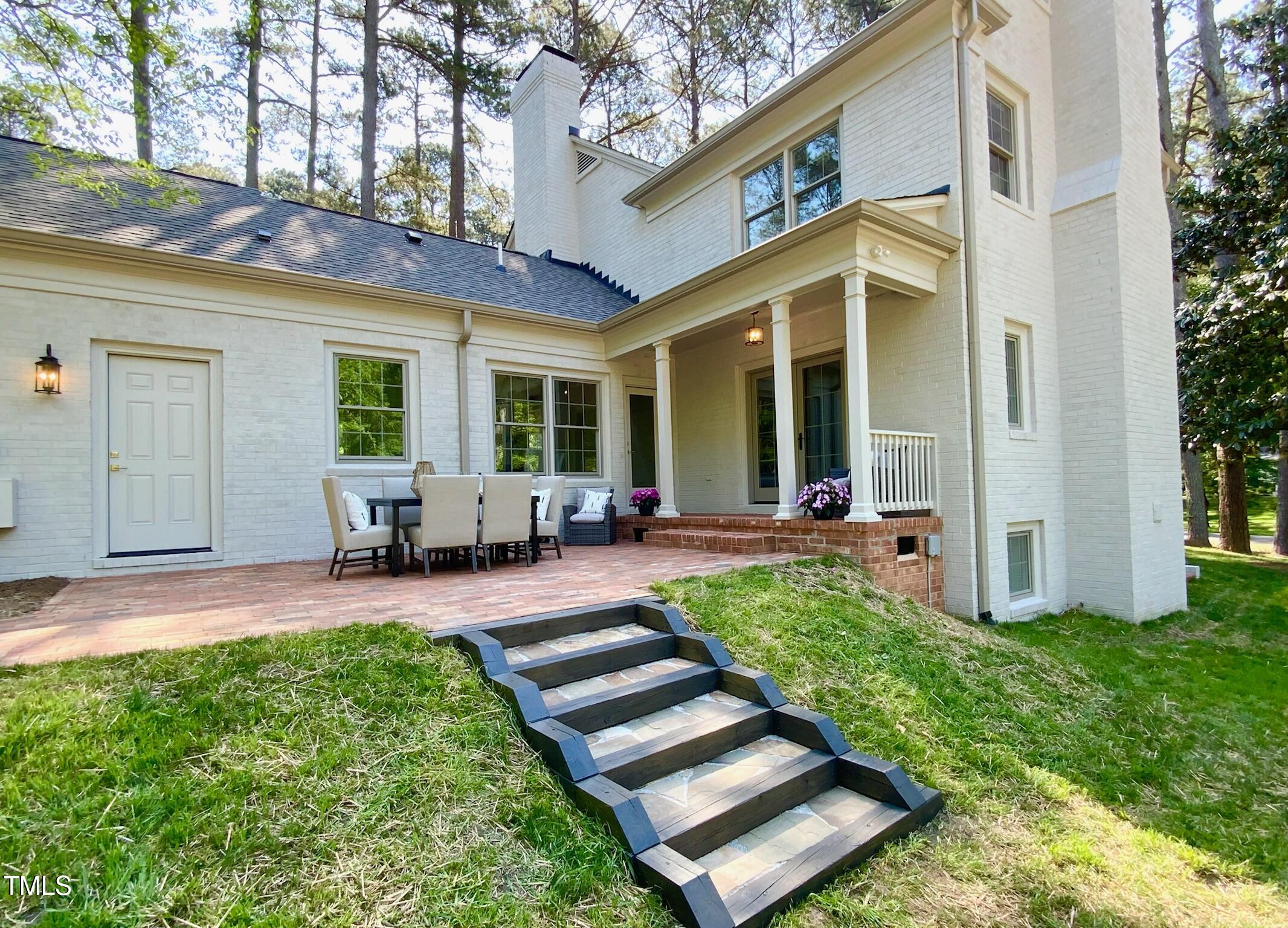 3838 Regent Road Durham, NC 27707 - Photo 8 of 55 a view of a house with backyard and porch