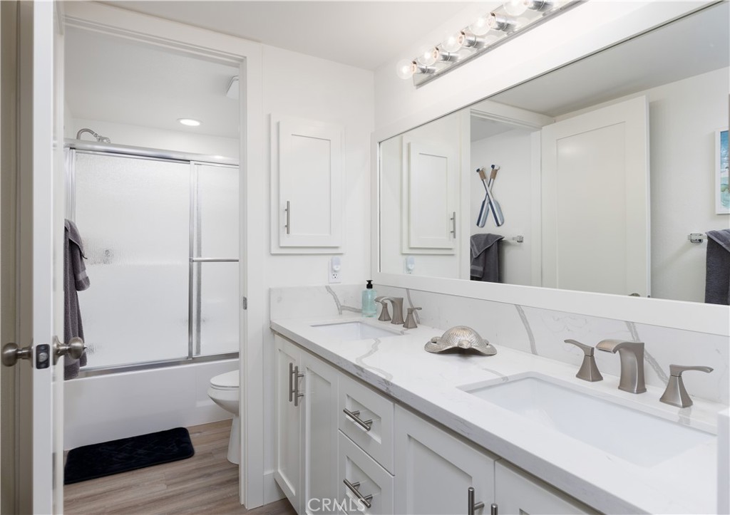 34116 Selva Road, Unit 308 Dana Point, CA 92629 - Photo 19 of 29 a bathroom with a sink and a mirror