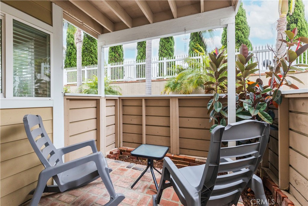 34116 Selva Road, Unit 308 Dana Point, CA 92629 - Photo 21 of 29 a view of a chairs and table in the patio