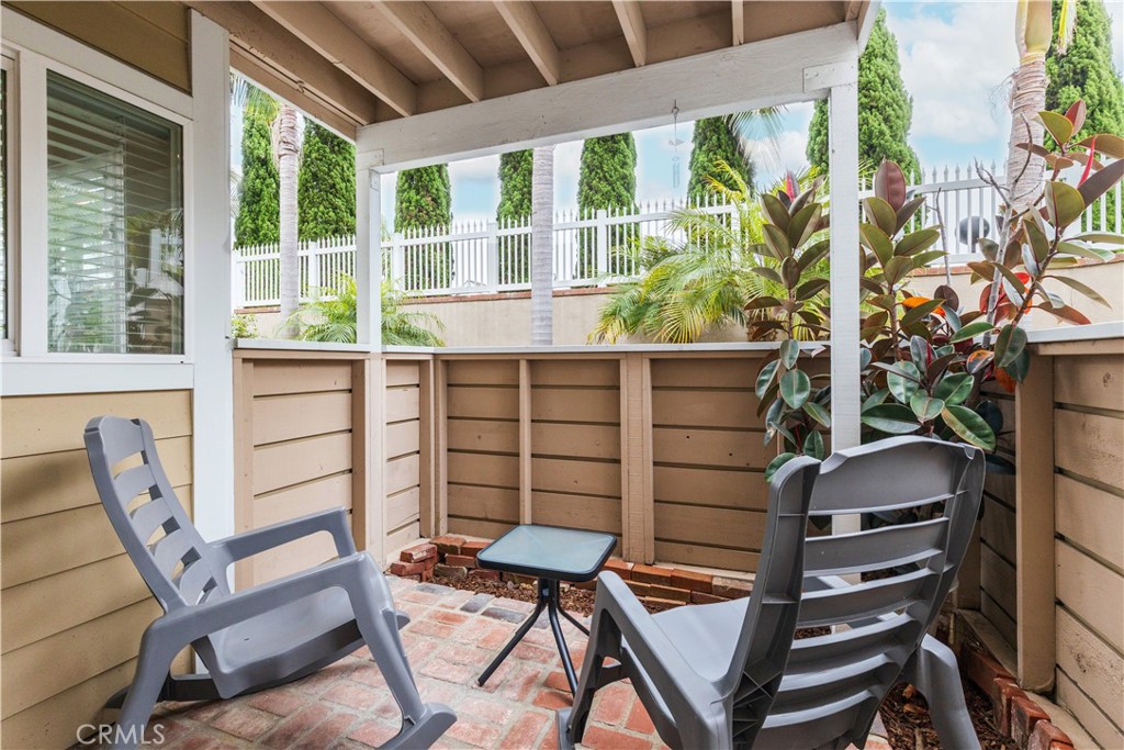 34116 Selva Road, Unit 308 Dana Point, CA 92629 - Photo 22 of 29 a view of a chairs and table in the patio
