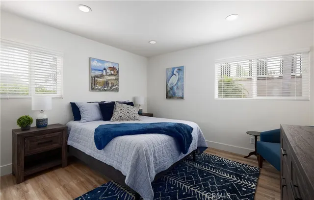 a bed room with a bed and a window