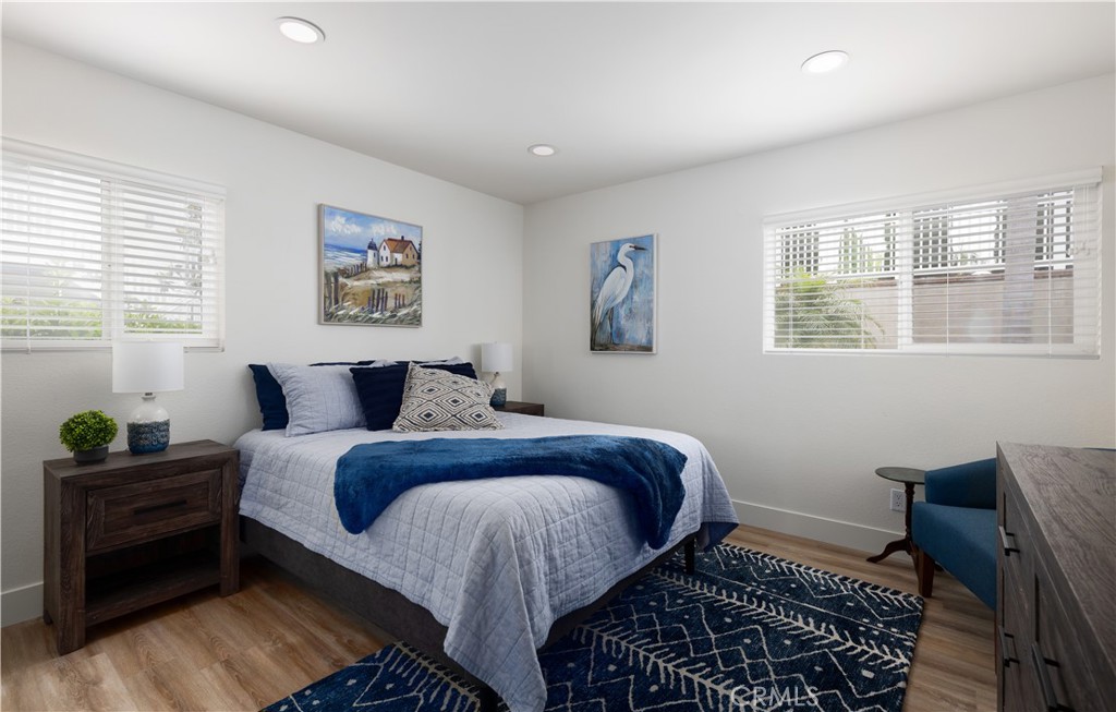 34116 Selva Road, Unit 308 Dana Point, CA 92629 - Photo 23 of 29 a bed room with a bed and a window