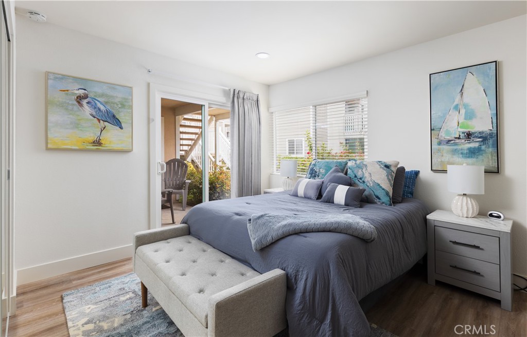 34116 Selva Road, Unit 308 Dana Point, CA 92629 - Photo 24 of 29 a bedroom with a bed and a couch