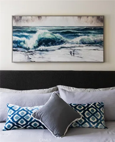 a close view of shoes stand and kitchen view