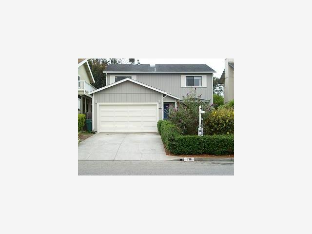 a picture of a house with a outdoor space