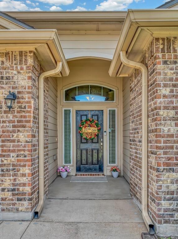 9801 Shallow Creek Drive Waco, TX 76708 - Photo 2 of 31 a front view of a house with a porch