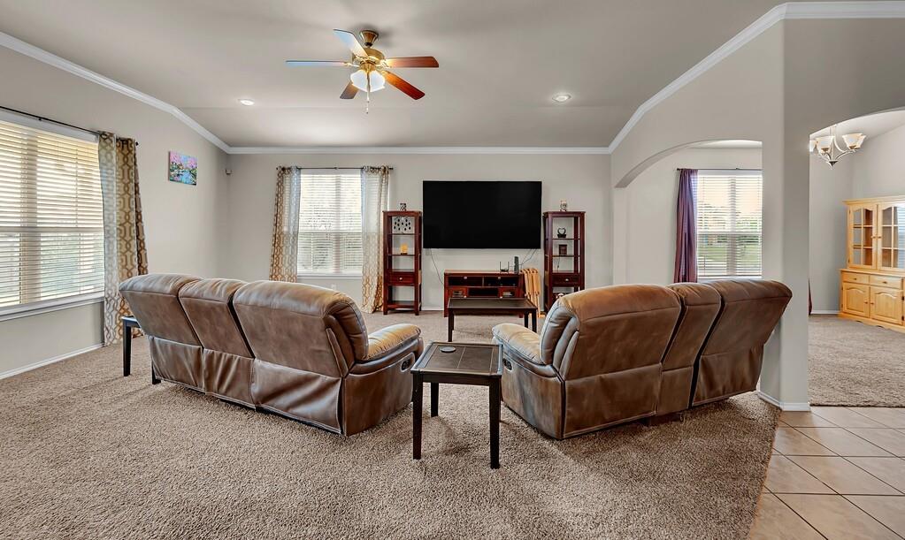 9801 Shallow Creek Drive Waco, TX 76708 - Photo 6 of 31 a living room with furniture and a flat screen tv