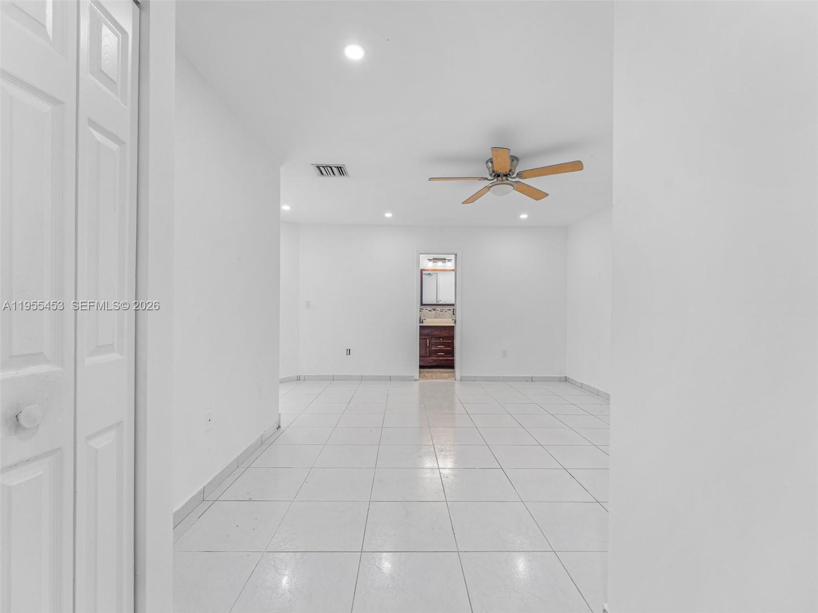 9435 Southwest 156th Place Miami, FL 33196 - Photo 16 of 45 a view of an empty room