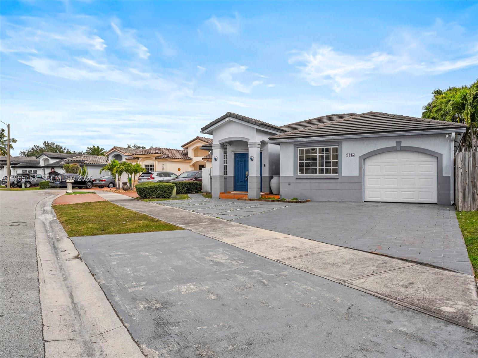 9435 Southwest 156th Place Miami, FL 33196 - Photo 39 of 45 a view of house with outdoor space and porch