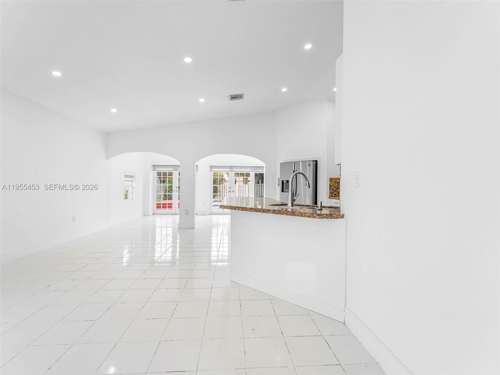 9435 Southwest 156th Place Miami, FL 33196 - Photo 6 of 45 a living room with furniture