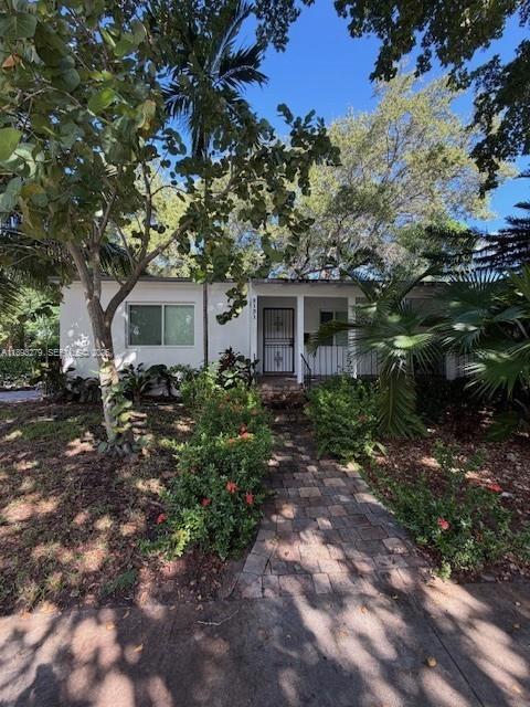 2131 Southwest 19th Avenue, Unit A Miami, FL 33145 - Photo 3 of 3 a view of house with outdoor space and garden