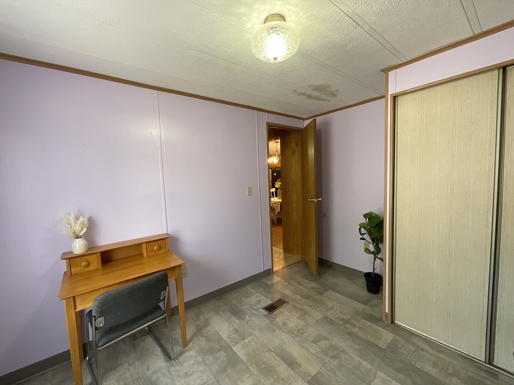 16 Agent Road Raymond, NH 03077 - Photo 21 of 35 a room with a door